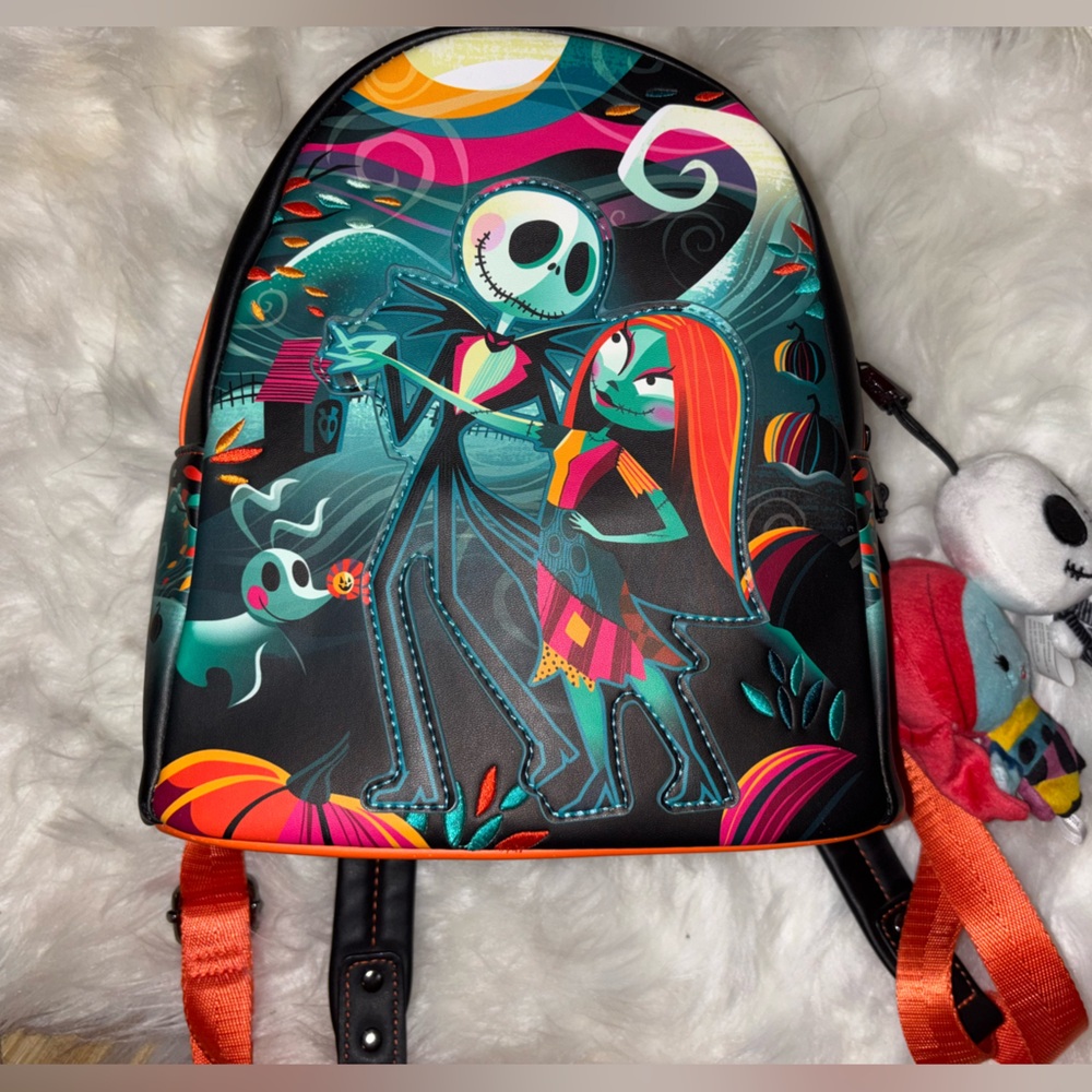 Loungefly Nightmare Before Christmas Jack and Sally Backpack with free charms!